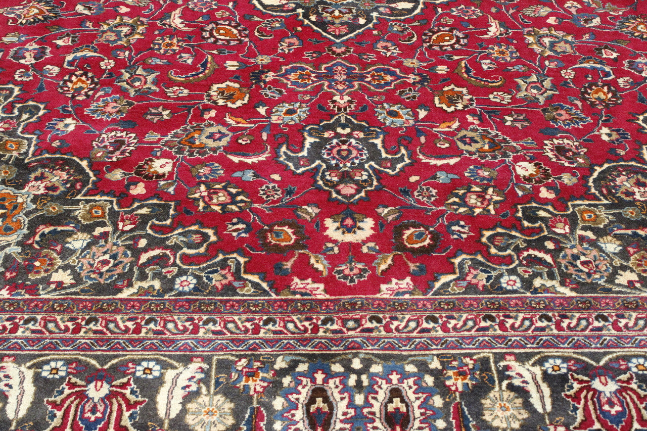 Traditional Antique Tabriz rug corner detail