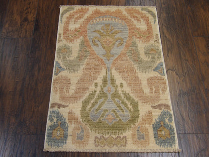 Close-up of wool pile, blue and ivory rug
