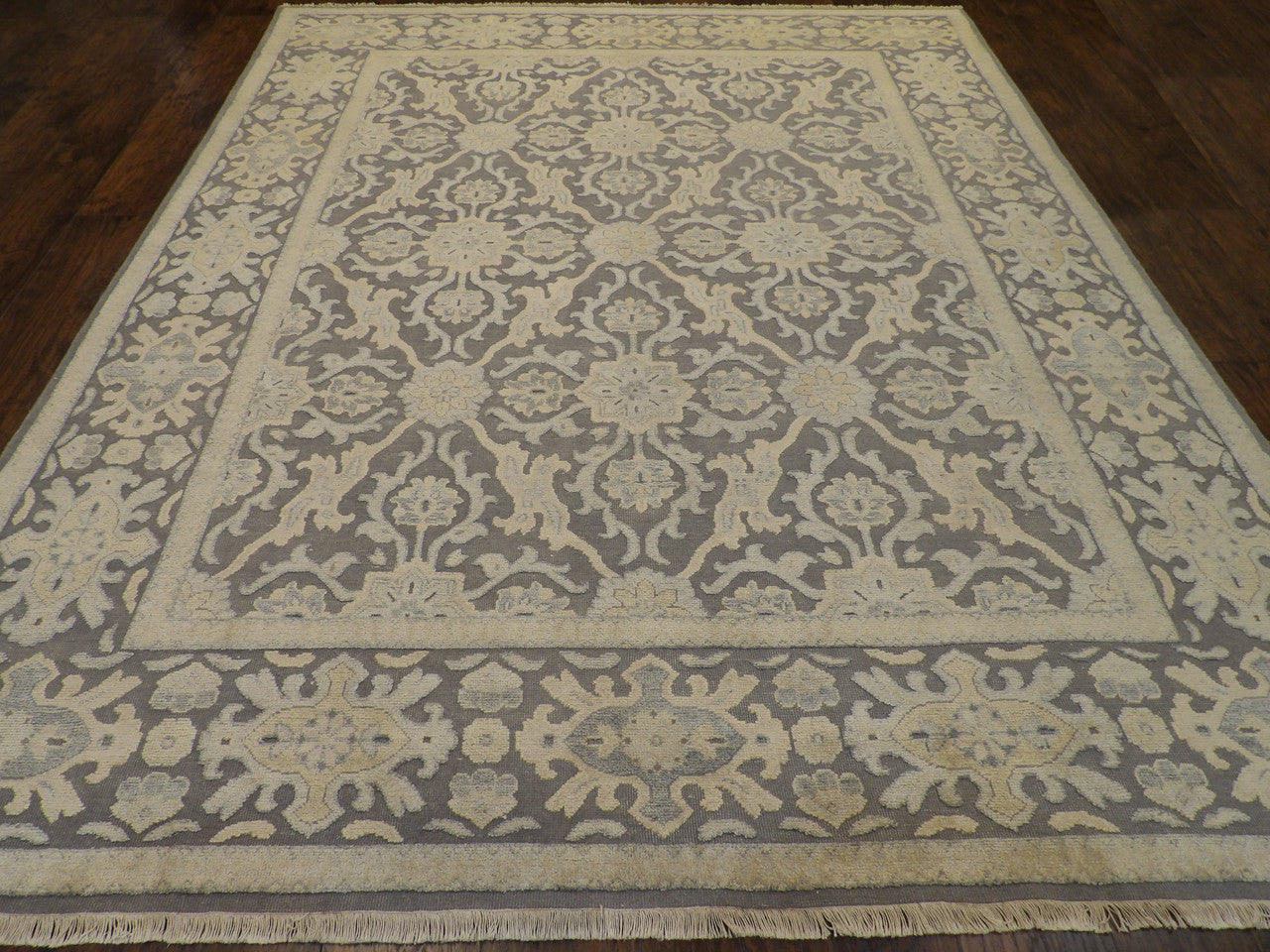 Back of hand-knotted Turkish Oushak rug showing construction