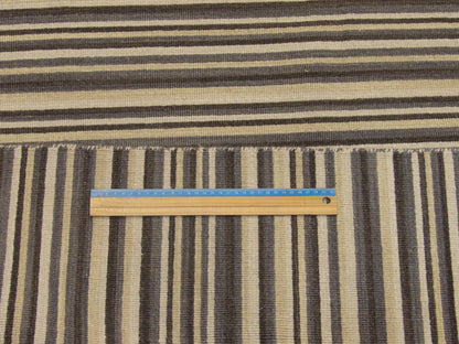 Full room view of blue coastal flat weave hand-knotted rug