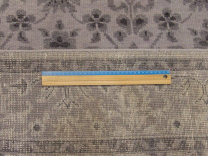 Gray & Purple Turk Oushak Wash rug in room setting
