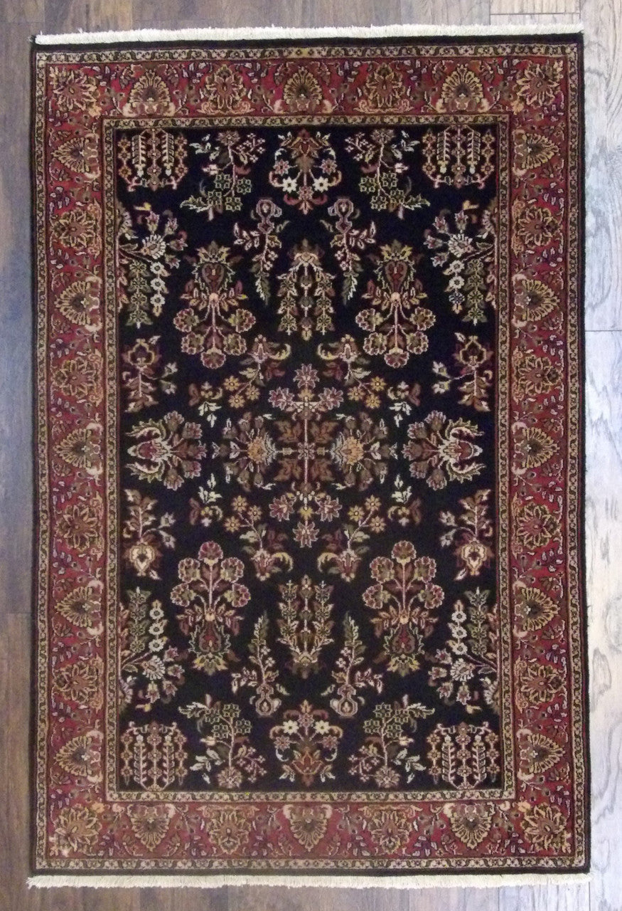 Fine Persian Sharookh hand-knotted wool rug in Black & Red, full view