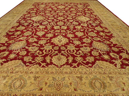 Close-up of wool pile, gold and red rug