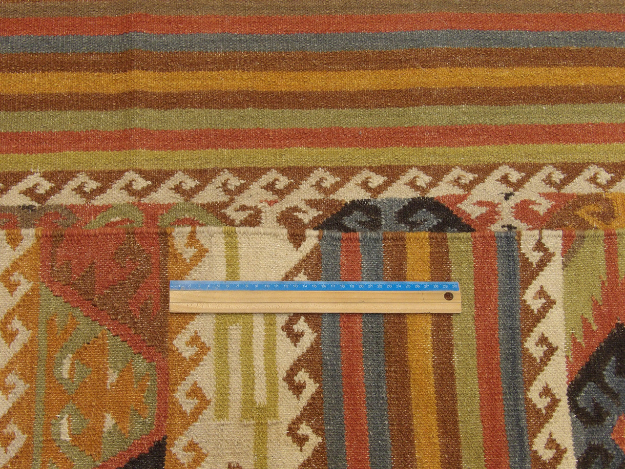 Brown & Rust Coastal Flat Weave Indoor/Outdoor Beach rug in room setting