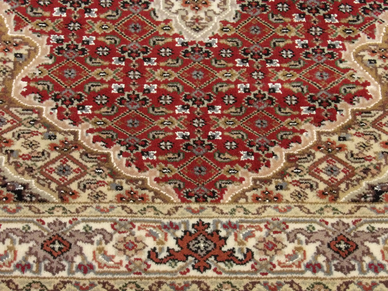 Fine Persian Tabriz rug border detail