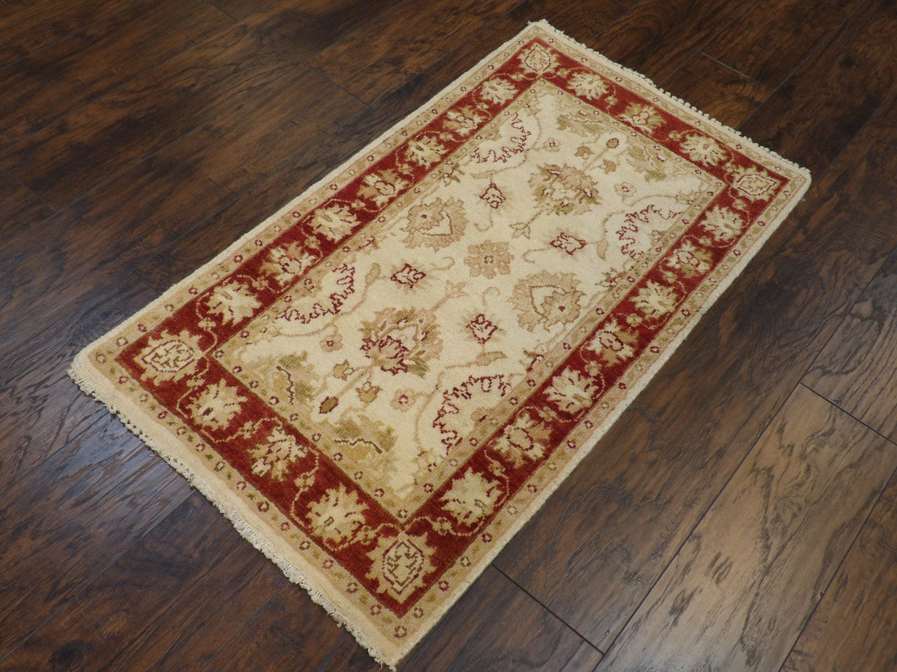 Ziegler pattern detail, beige and red hand-knotted rug