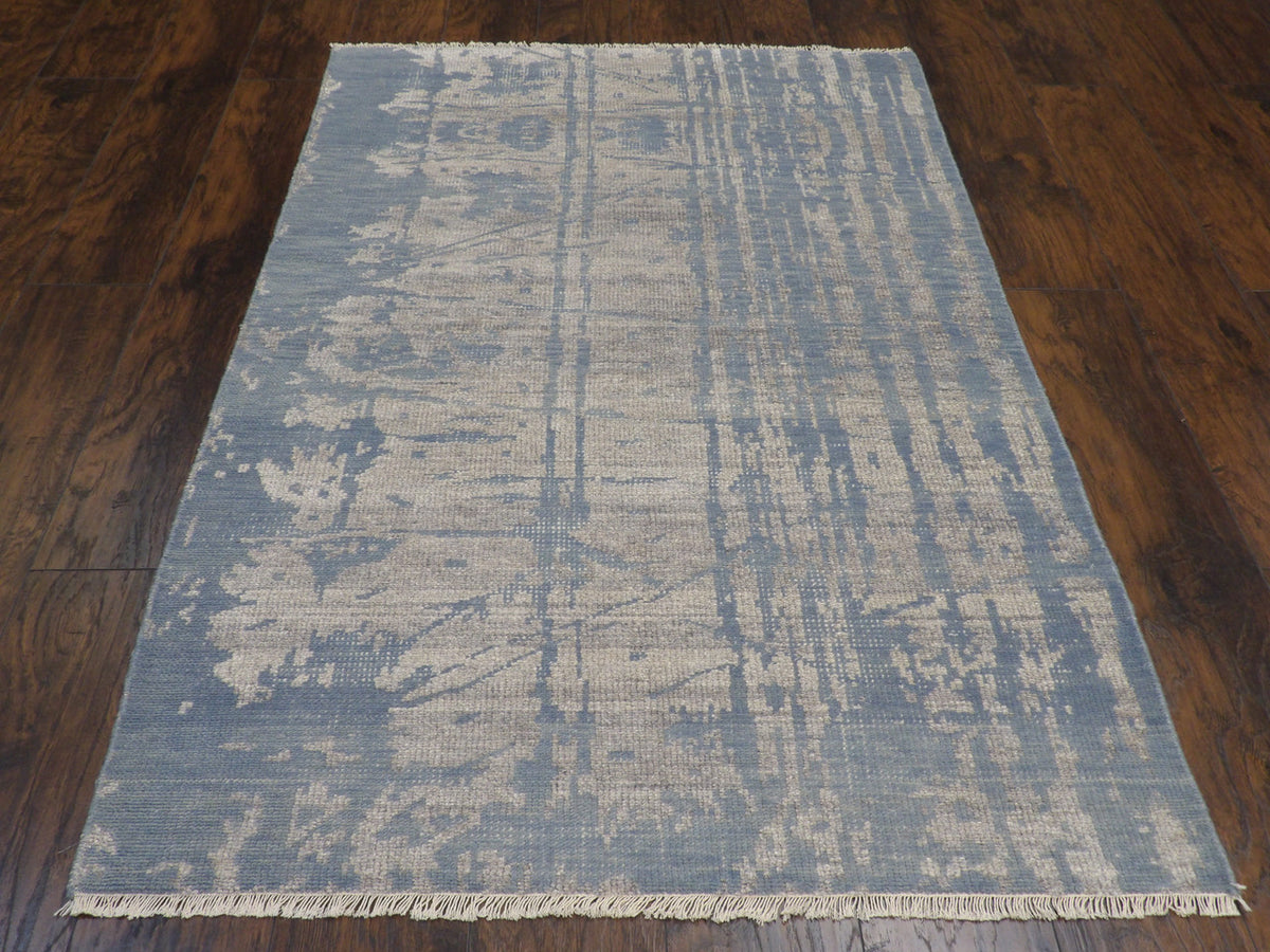 Close-up of wool pile, blue abstract rug
