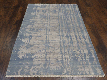 Close-up of wool pile, blue abstract rug