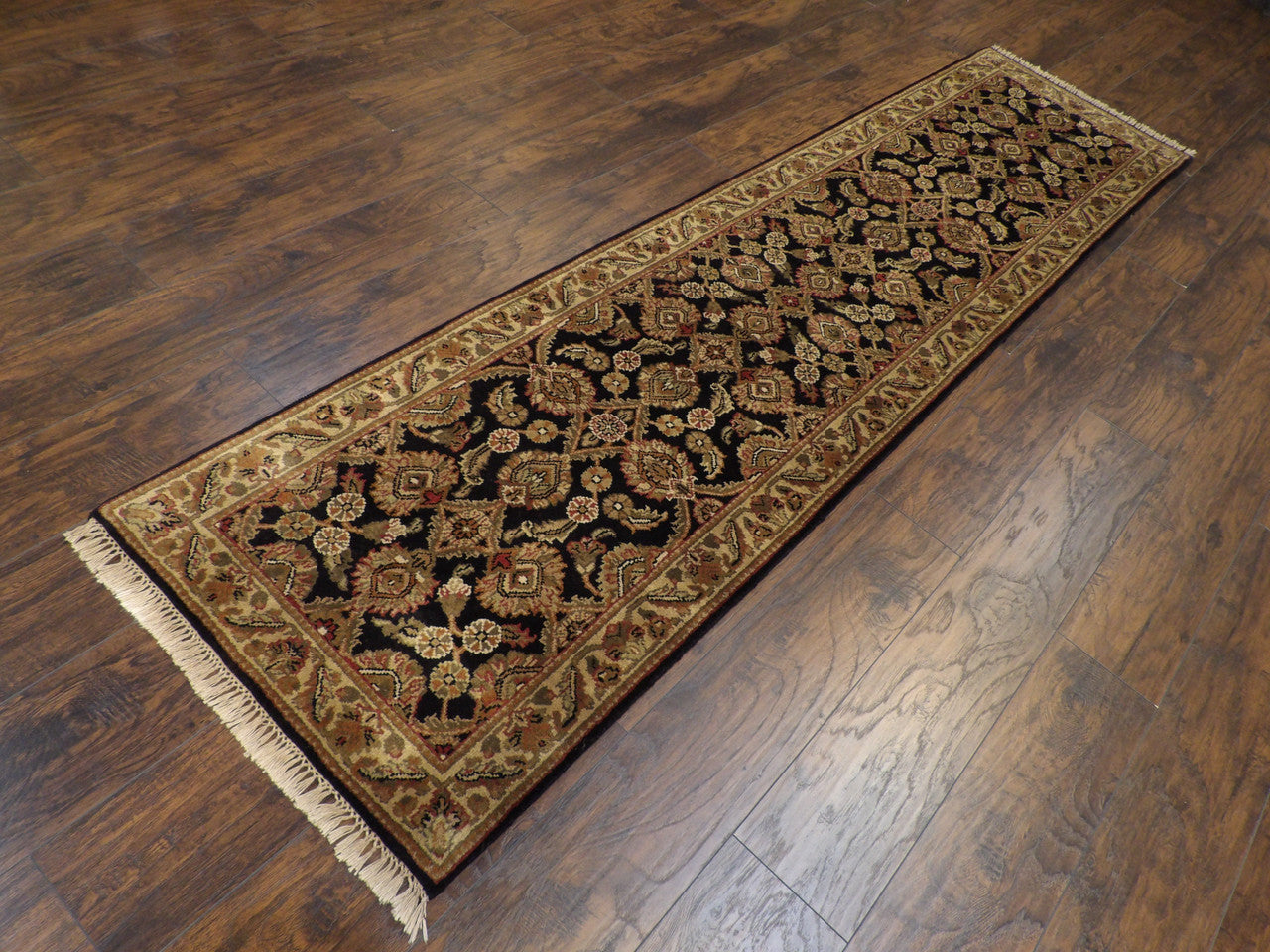 Kashan medallion pattern detail, black and gold antique wash runner