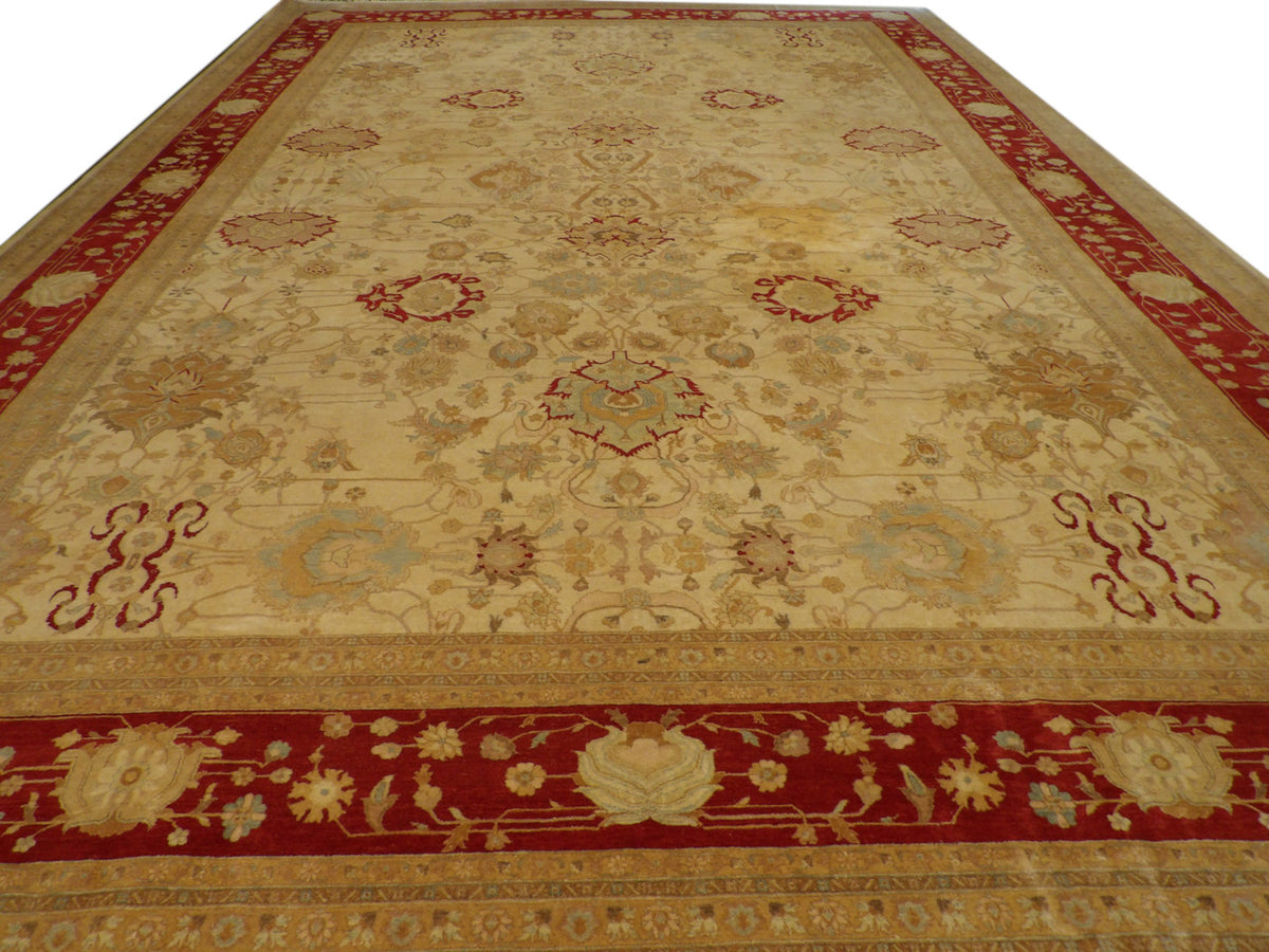 Close-up of wool pile, beige and red rug