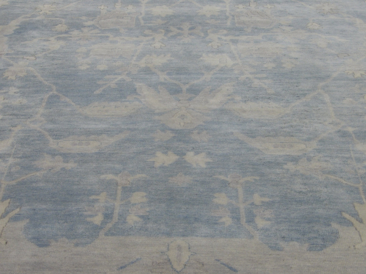 Close-up of wool pile, blue and gray rug
