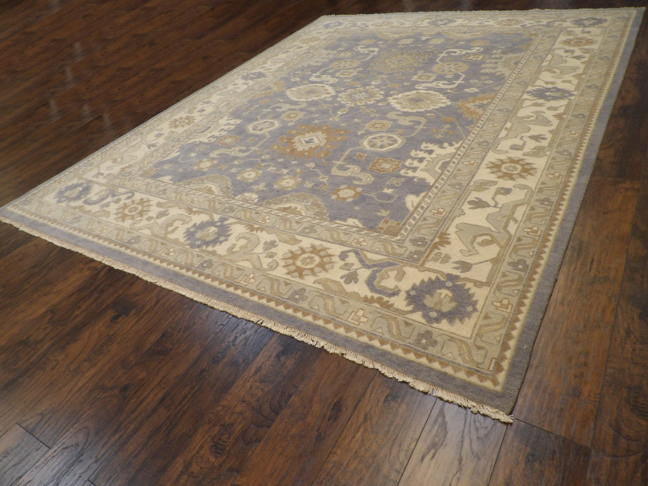 Back of hand-knotted Turkish Oushak rug showing construction