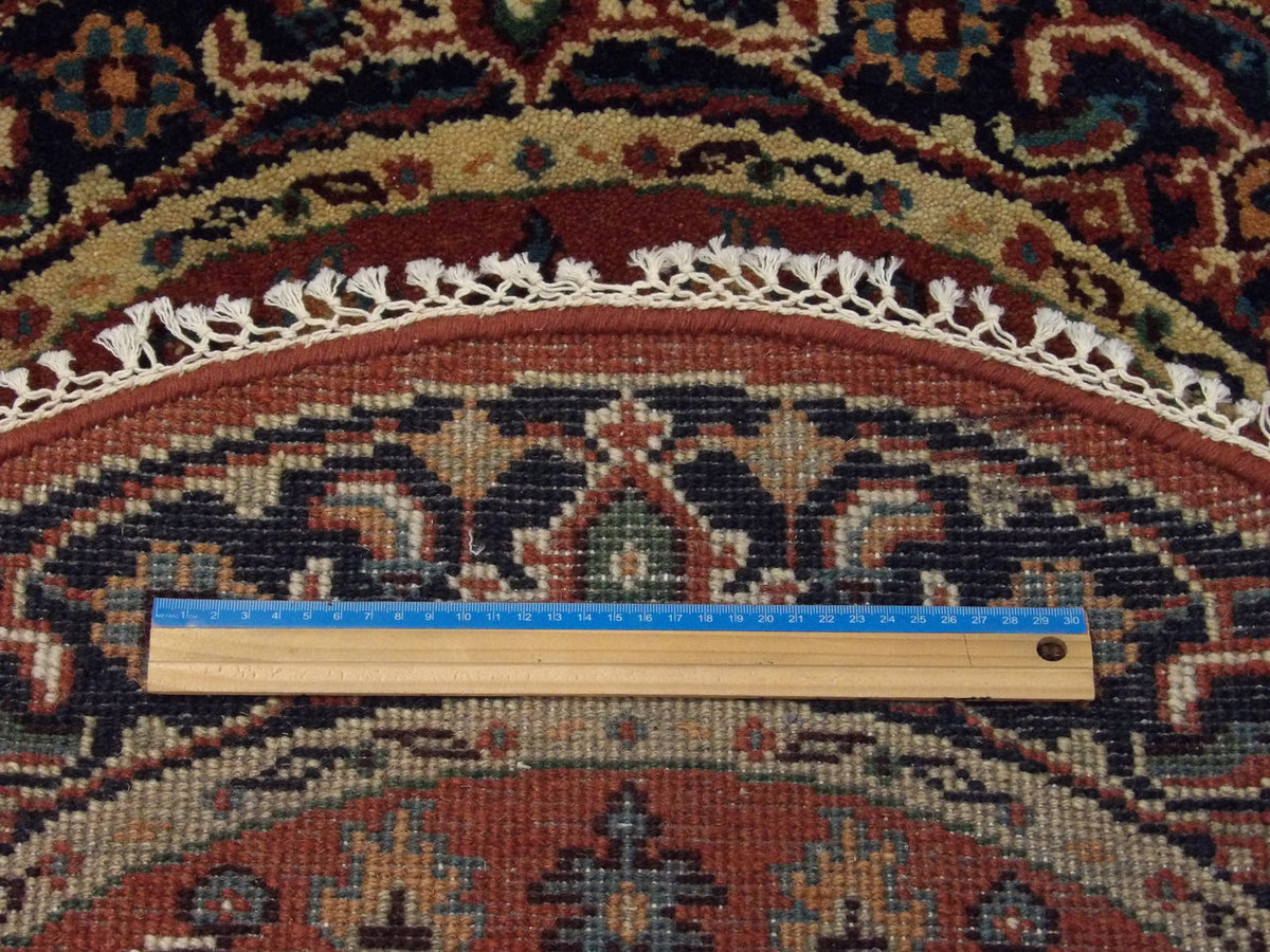 Blue & Rust Tribal Heriz rug in room setting