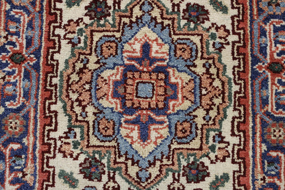 Tribal Heriz rug corner detail