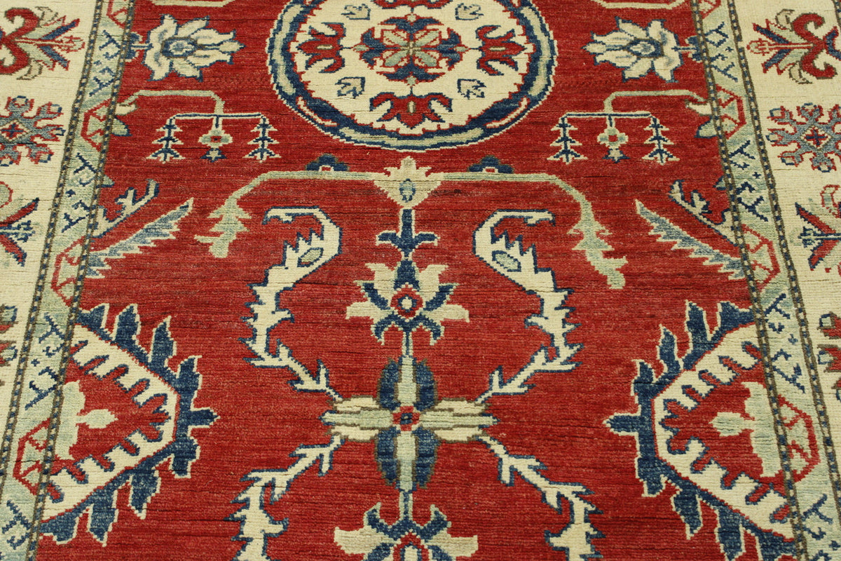 Tribal Super Kazak rug corner detail