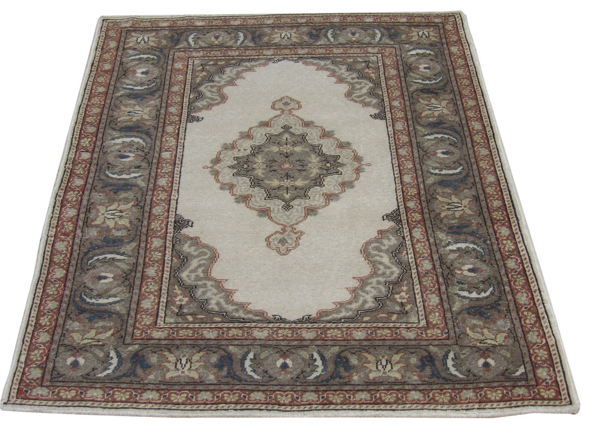 Antique Oushak rug in a room setting