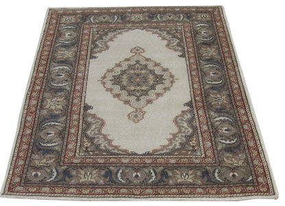 Antique Oushak rug in a room setting