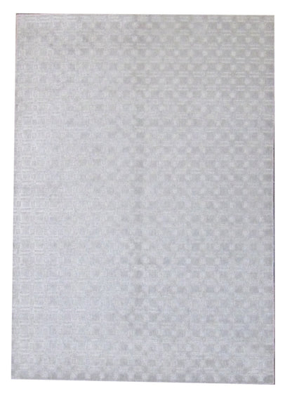 Modern plain carved hand-knotted wool-silk rug in gray, full view