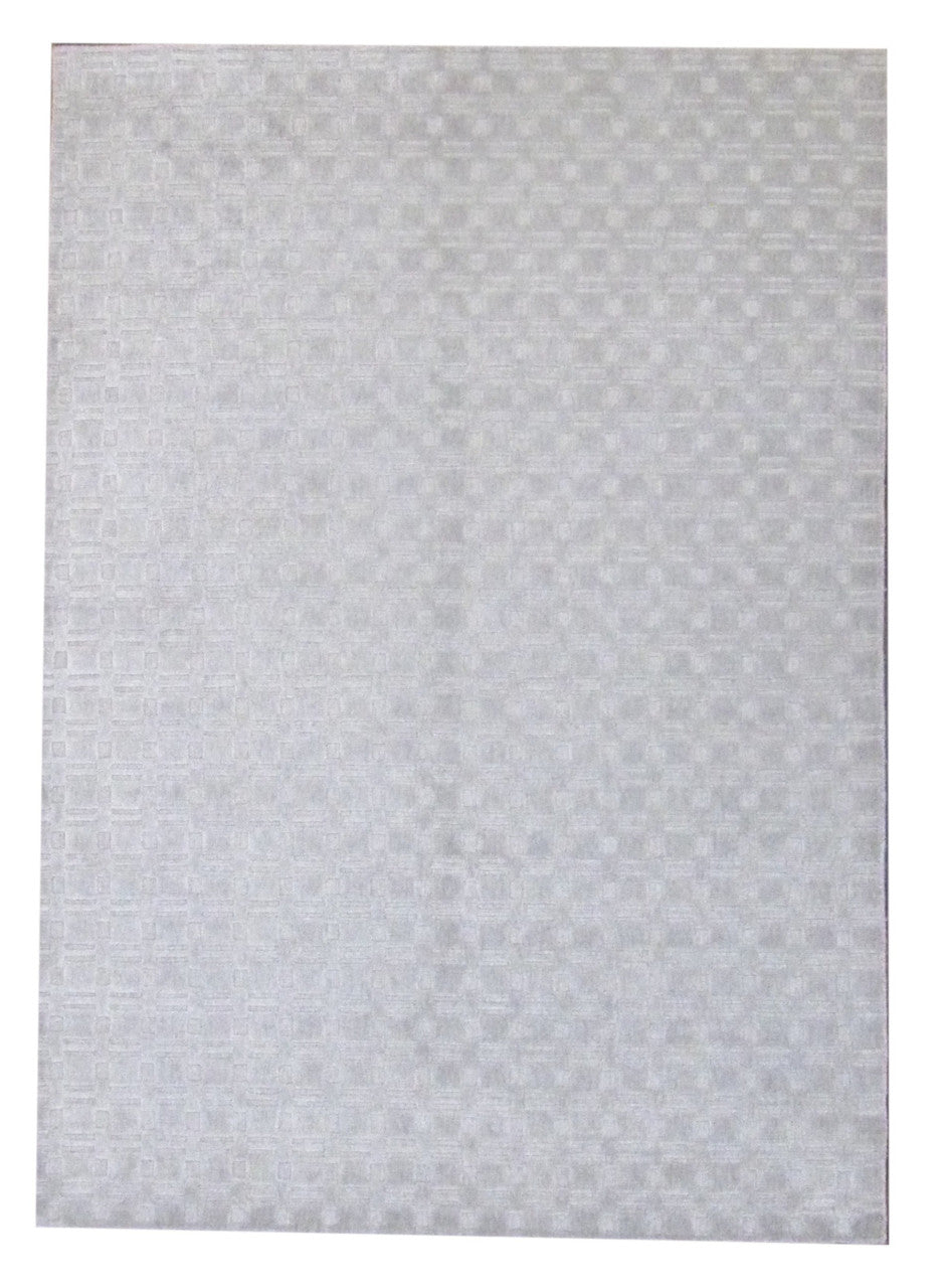 Modern plain carved hand-knotted wool-silk rug in gray, full view