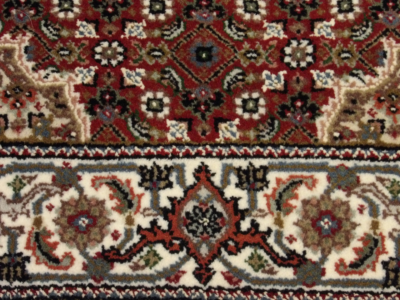 Fine Persian Tabriz rug border detail