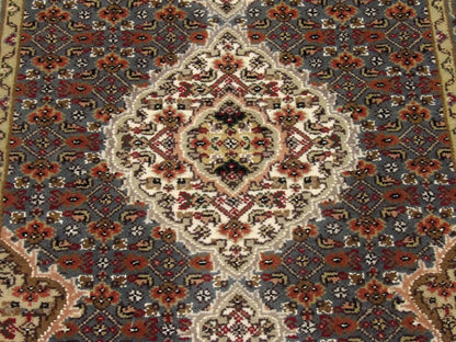 Teal wool texture close-up, Persian Tabriz runner