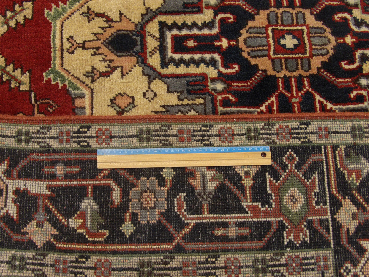 Blue & Red Tribal Heriz rug in room setting
