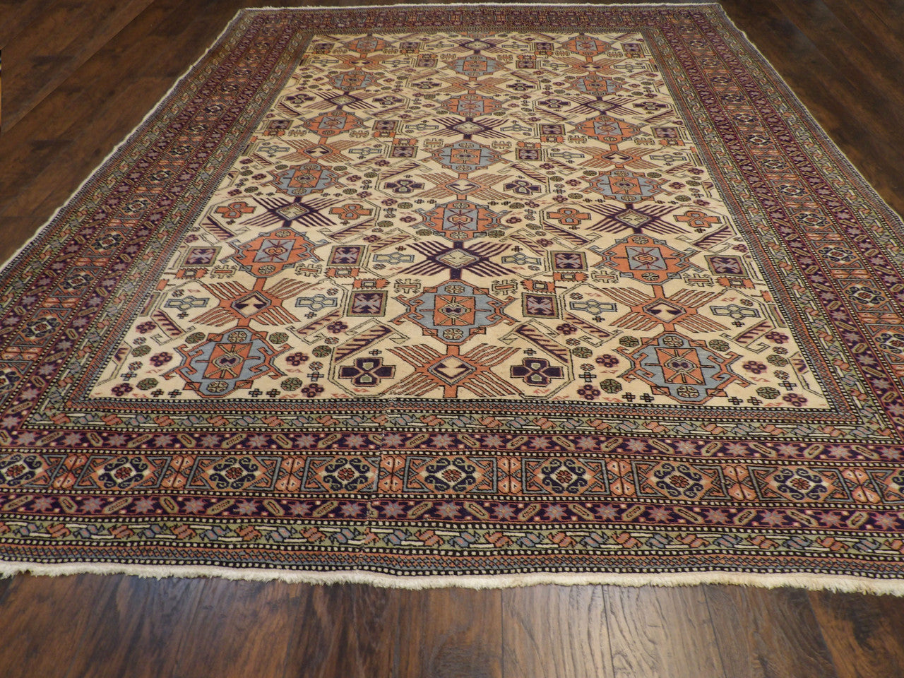 Close-up of wool pile, antique blue and ivory rug