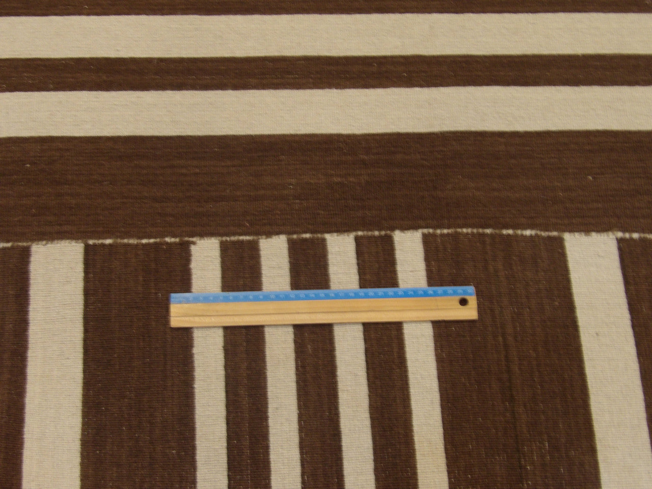 Brown & Beige Coastal Flat Weave Indoor/Outdoor Beach rug in room setting