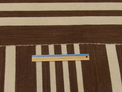 Brown & Beige Coastal Flat Weave Indoor/Outdoor Beach rug in room setting