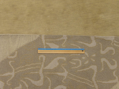 Brown and beige curve rug in room setting