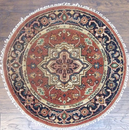 Tribal Heriz hand-knotted wool rug in Blue & Rust, full view