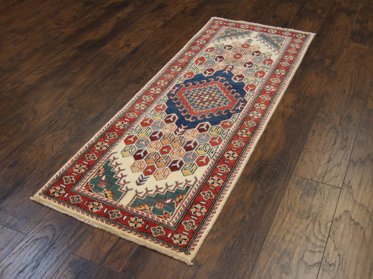 Full length view of tribal Kazak runner