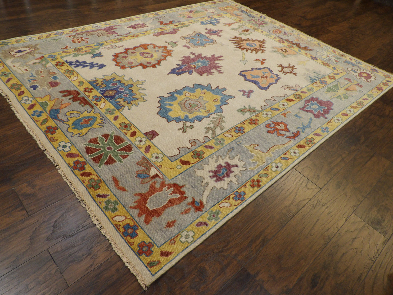Tribal Oushak pattern detail, blue and ivory hand-knotted rug