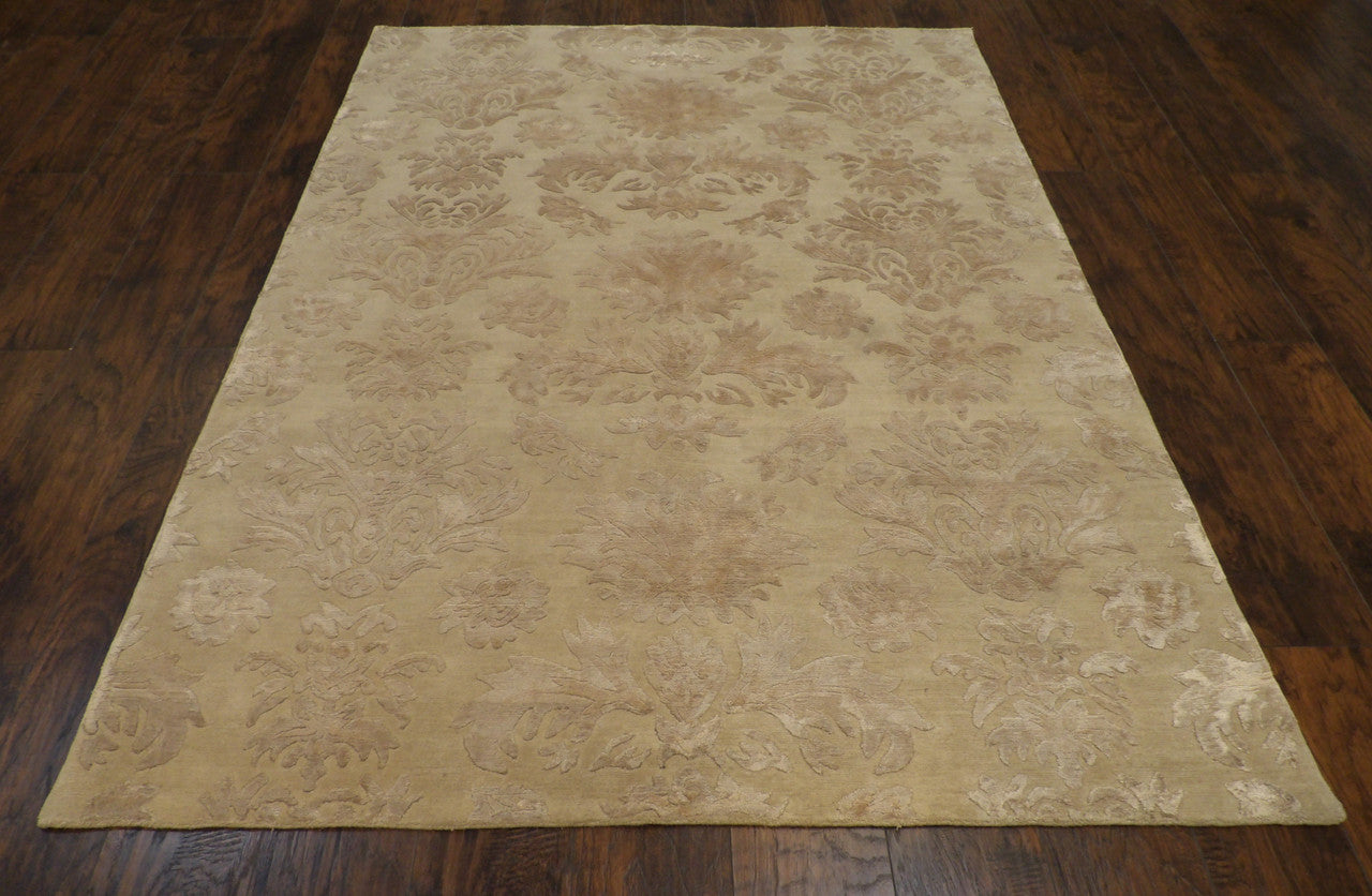 Close-up of carved wool-silk pile, beige rug