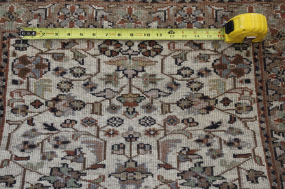 Beige Traditional Fine Herati rug in room setting