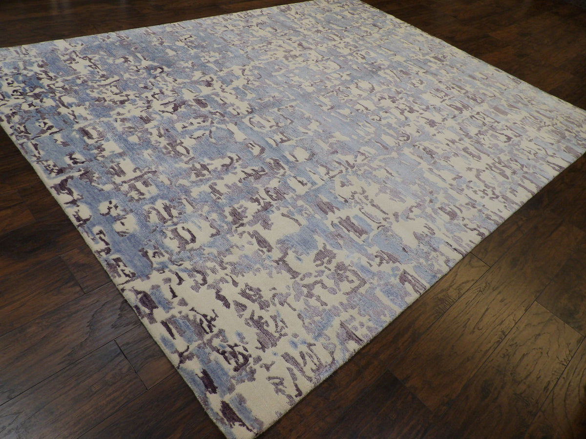 Abstract carved rug border detail, blue and white