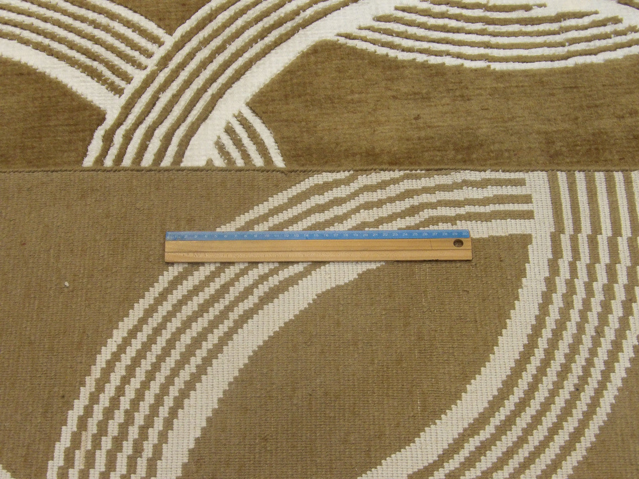 Brown & Beige Modern Nepalese Circle Design rug in room setting