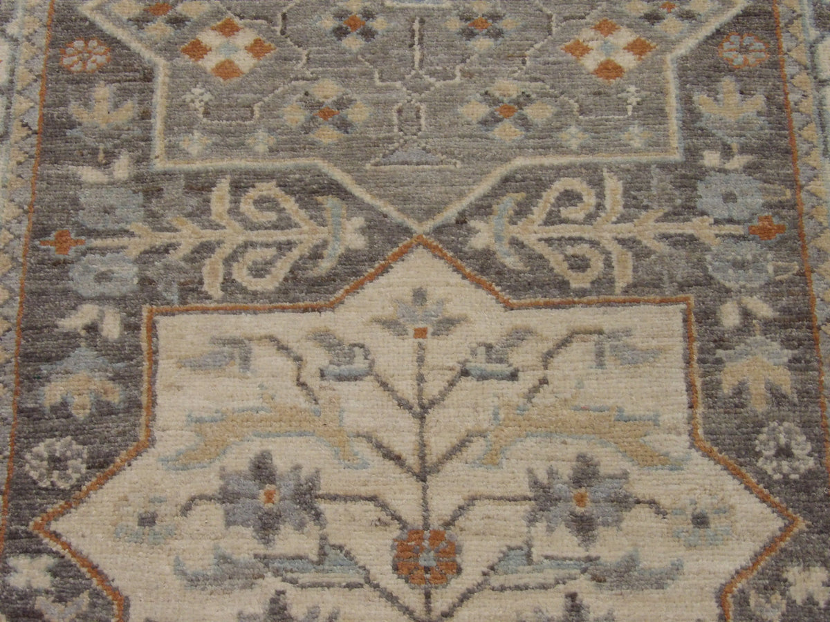 Back of Oushak Chobi hand-knotted rug