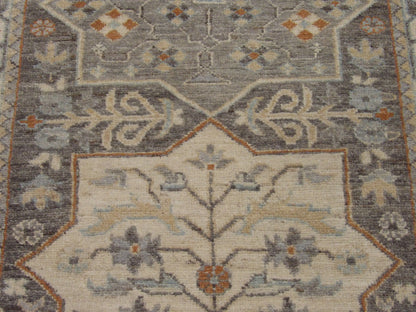 Back of Oushak Chobi hand-knotted rug