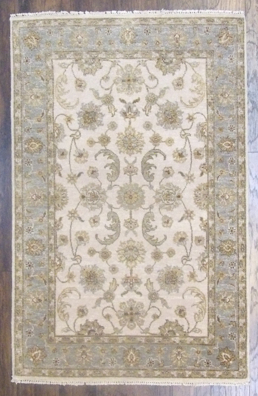 Indo Chobi hand-knotted wool rug in blue and ivory, full view
