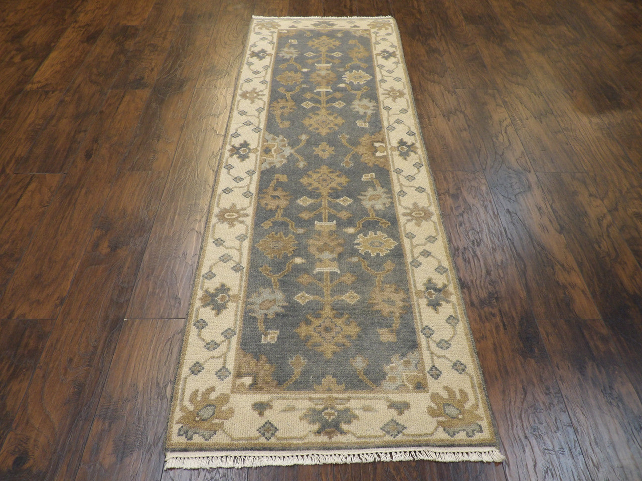 Back of hand-knotted Oushak runner showing construction