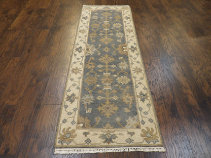 Back of hand-knotted Oushak runner showing construction