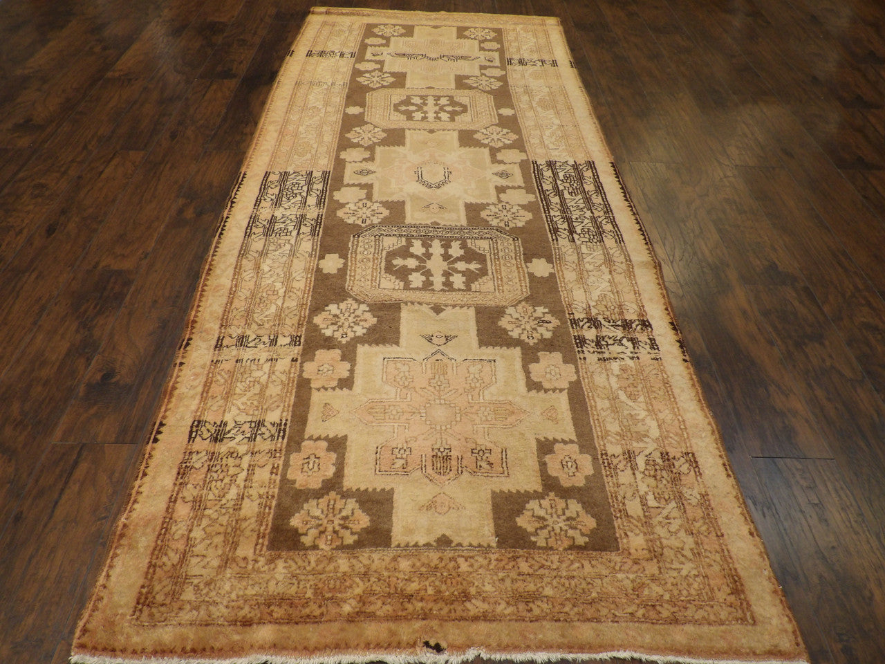 Back of hand-knotted antique Khotan runner showing construction