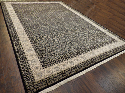 Black Persian Mir rug in a formal room setting