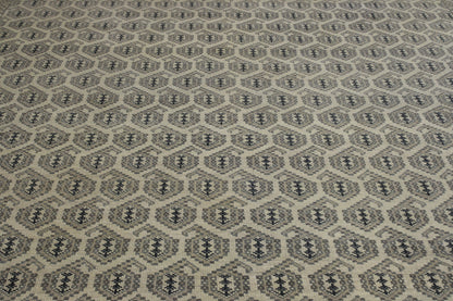 Gray & Beige Oushak Silverwash Paisley Design rug in room setting