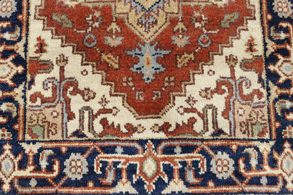 Tribal Heriz rug corner detail