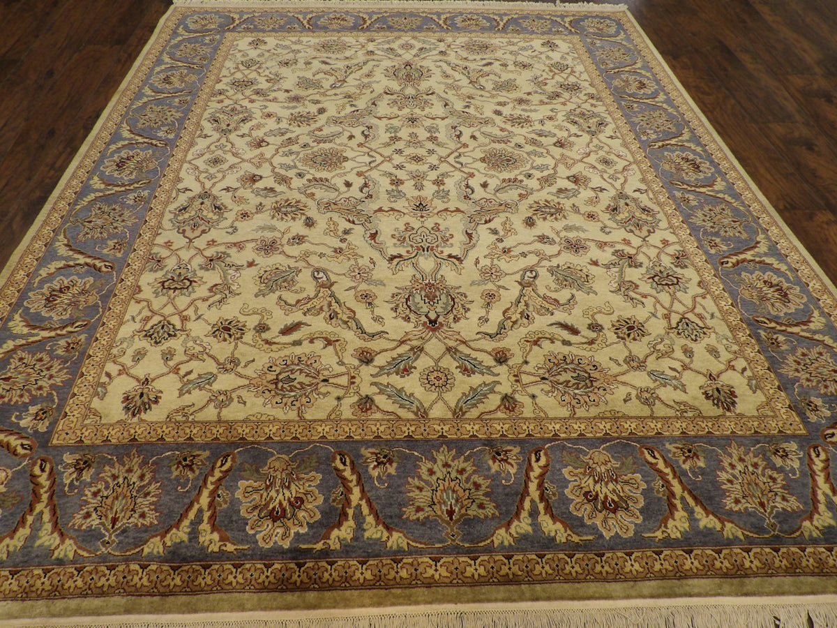 Close-up of wool pile, blue and green rug