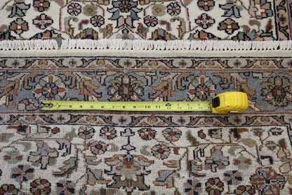 Beige Traditional Heraki Design rug in room setting