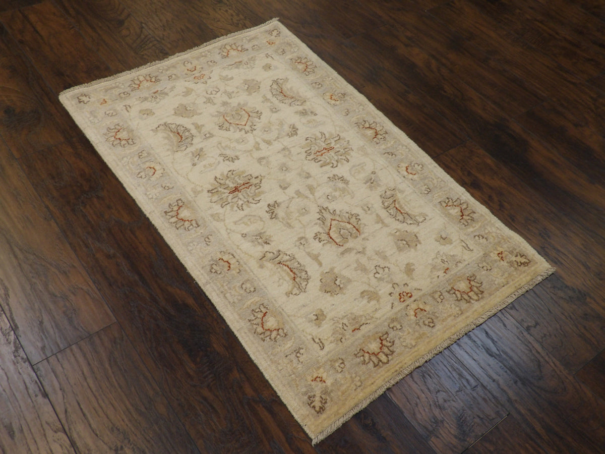 Beige and blue Oushak Chobie rug in an entryway setting