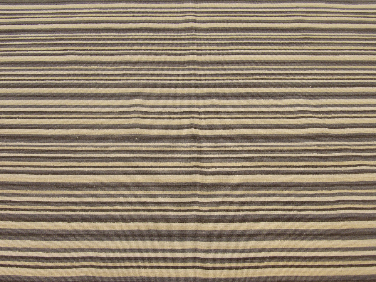 Coastal rug edge detail, blue and ivory